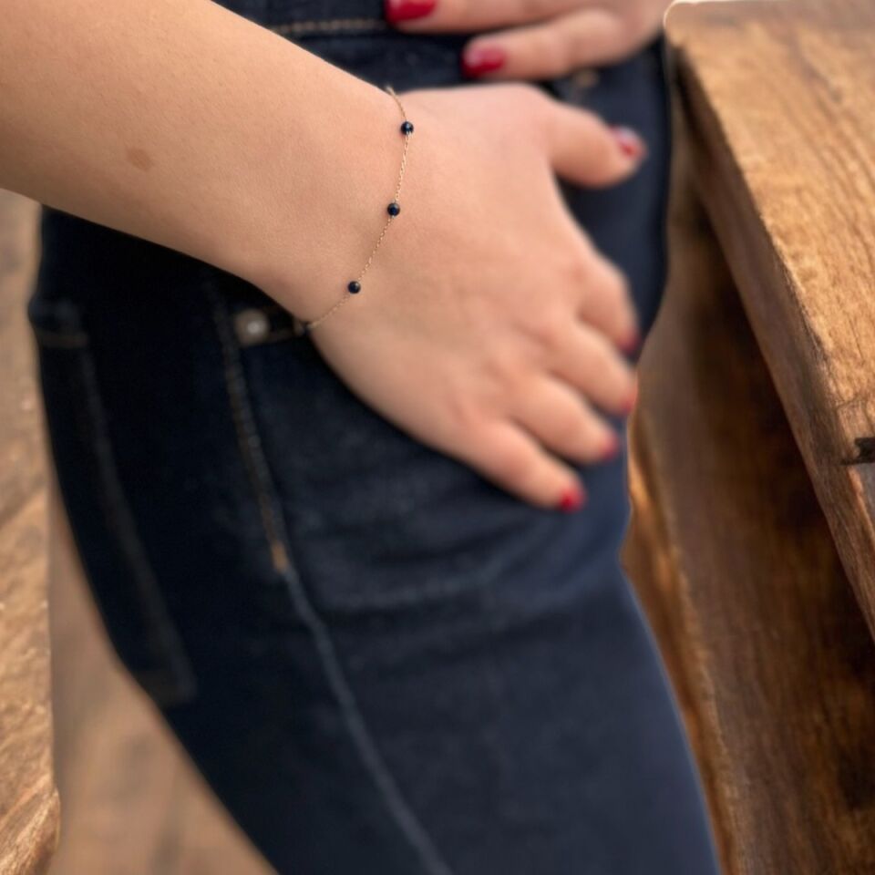 14 AYAR LACİVERT KRİSTAL TAŞLI VE DORİKALI ALTIN BİLEKLİK