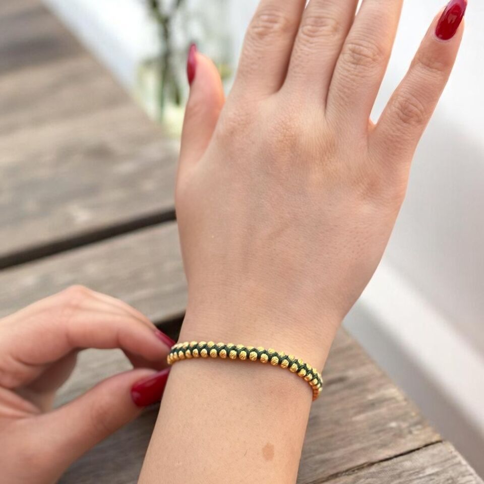 22 AYAR YEŞİL İPLİ DORİKA TOPLU ÖRME BİLEKLİK