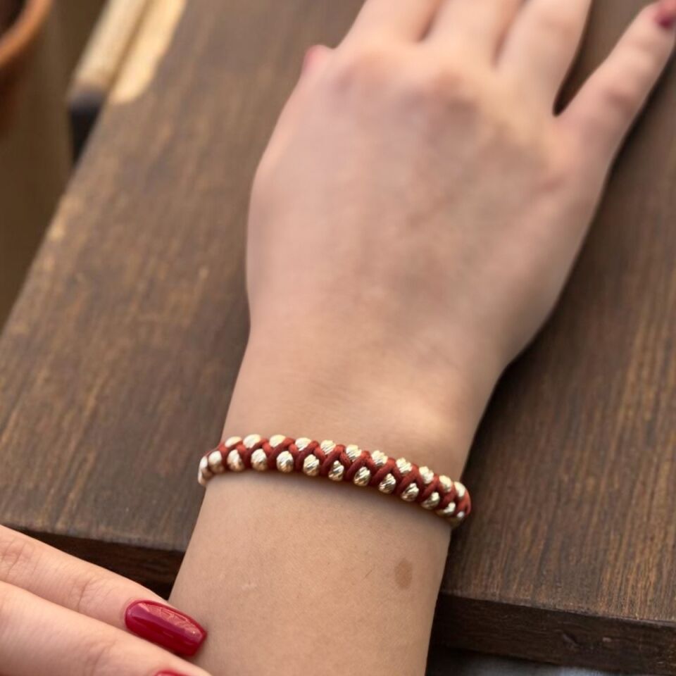 14 AYAR DORİKA TOPLU TARÇIN RENGİ İPLİ ÖRME BİLEKLİK